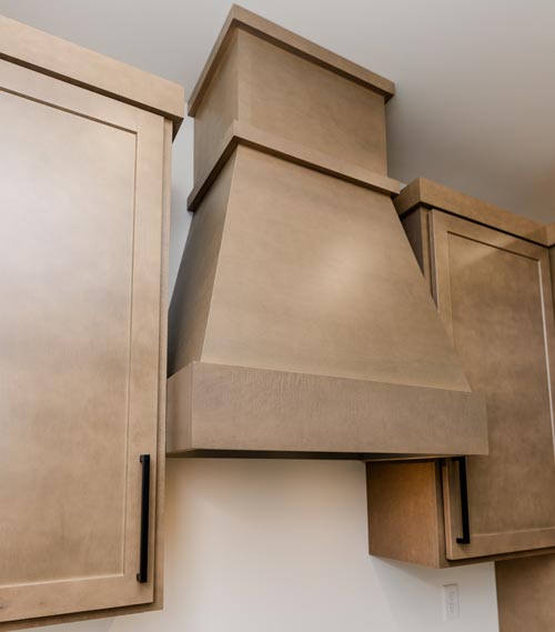 Custom oven hood installation in Vergas, MN featuring detailed craftsmanship and premium materials